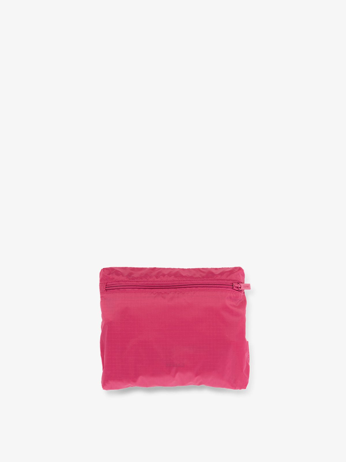 CALPAK Compakt foldable duffle bag for travel in dragonfruit pink