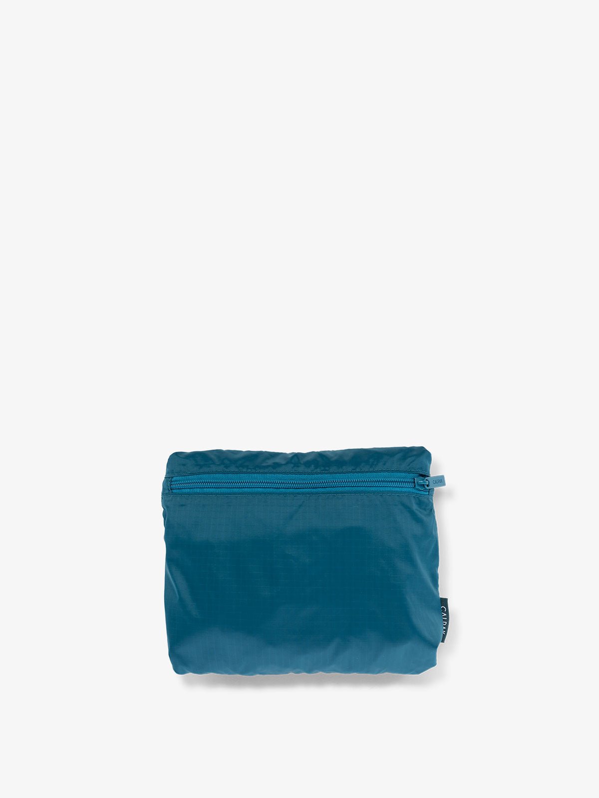 CALPAK Compakt foldable duffle bag for travel in lagoon blue