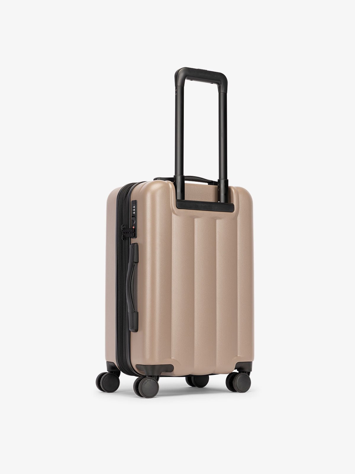 CALPAK carry-on luggage featuring dual spinner wheels and bottom grab handle in chocolate