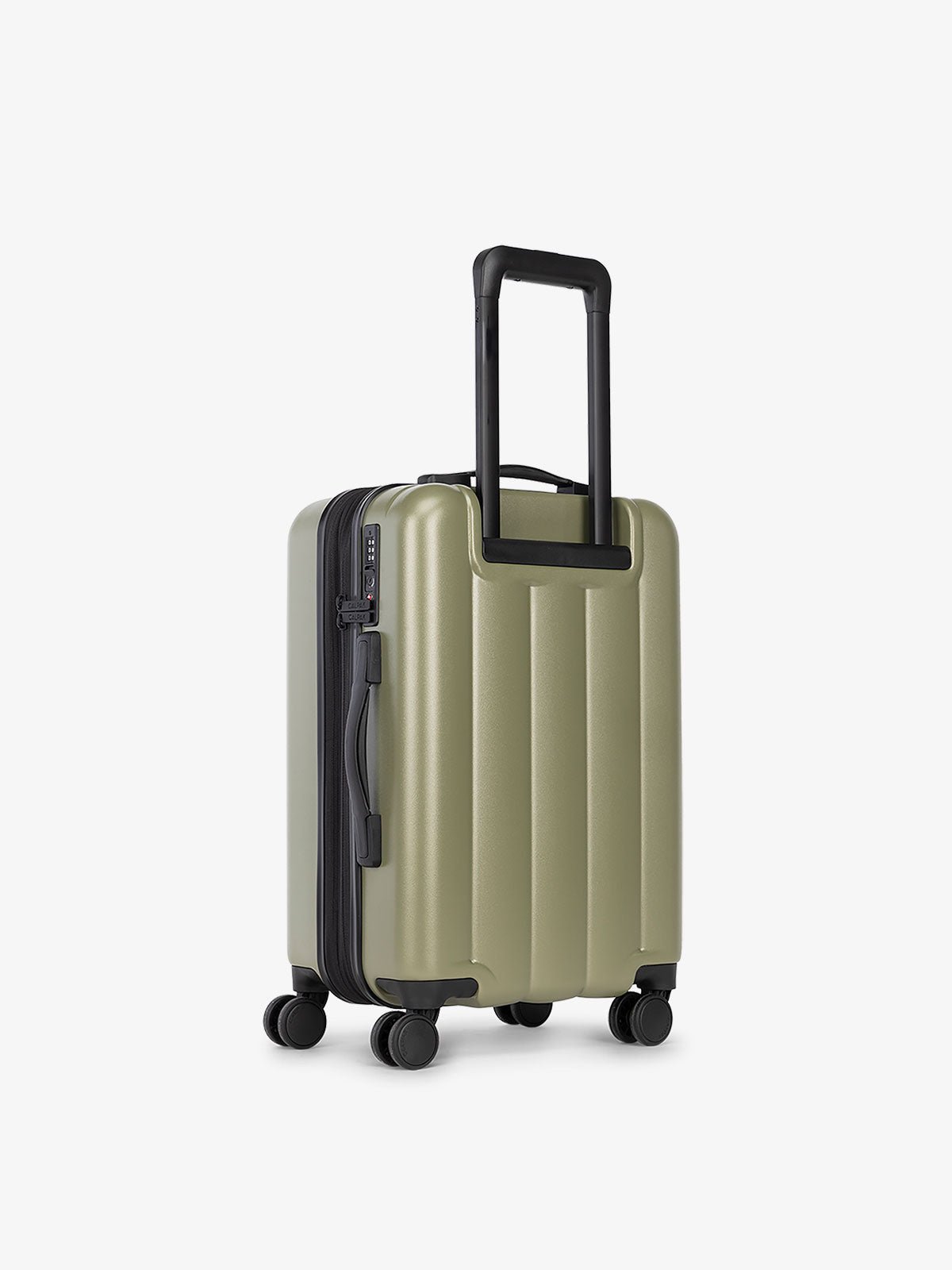 CALPAK carry-on luggage featuring dual spinner wheels and bottom grab handle