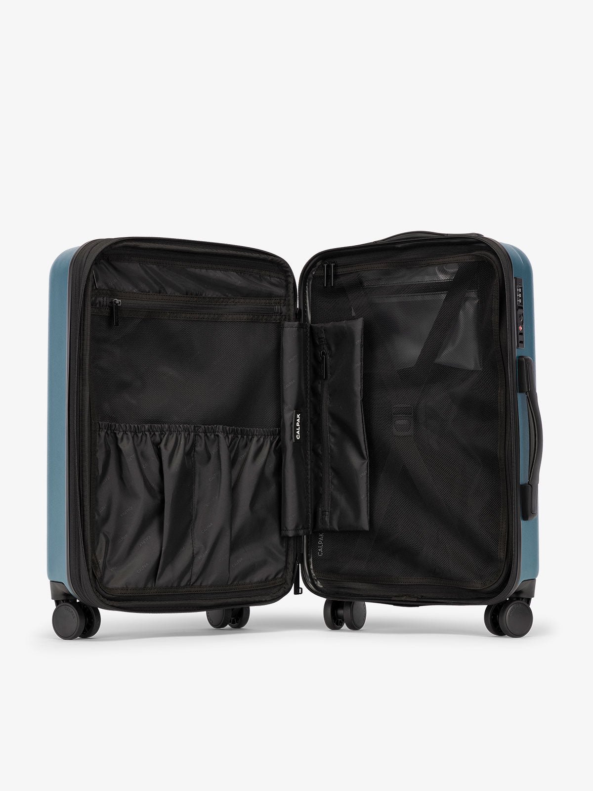Pacific blue CALPAK Evry Carry-On Luggage features divided compartments with interior pockets for organized packing