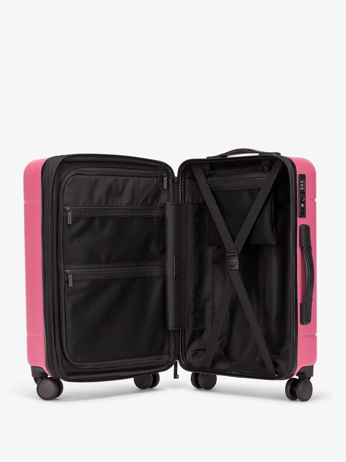 Interior of Hue rolling carry-on suitcase in hot pink dragonfruit