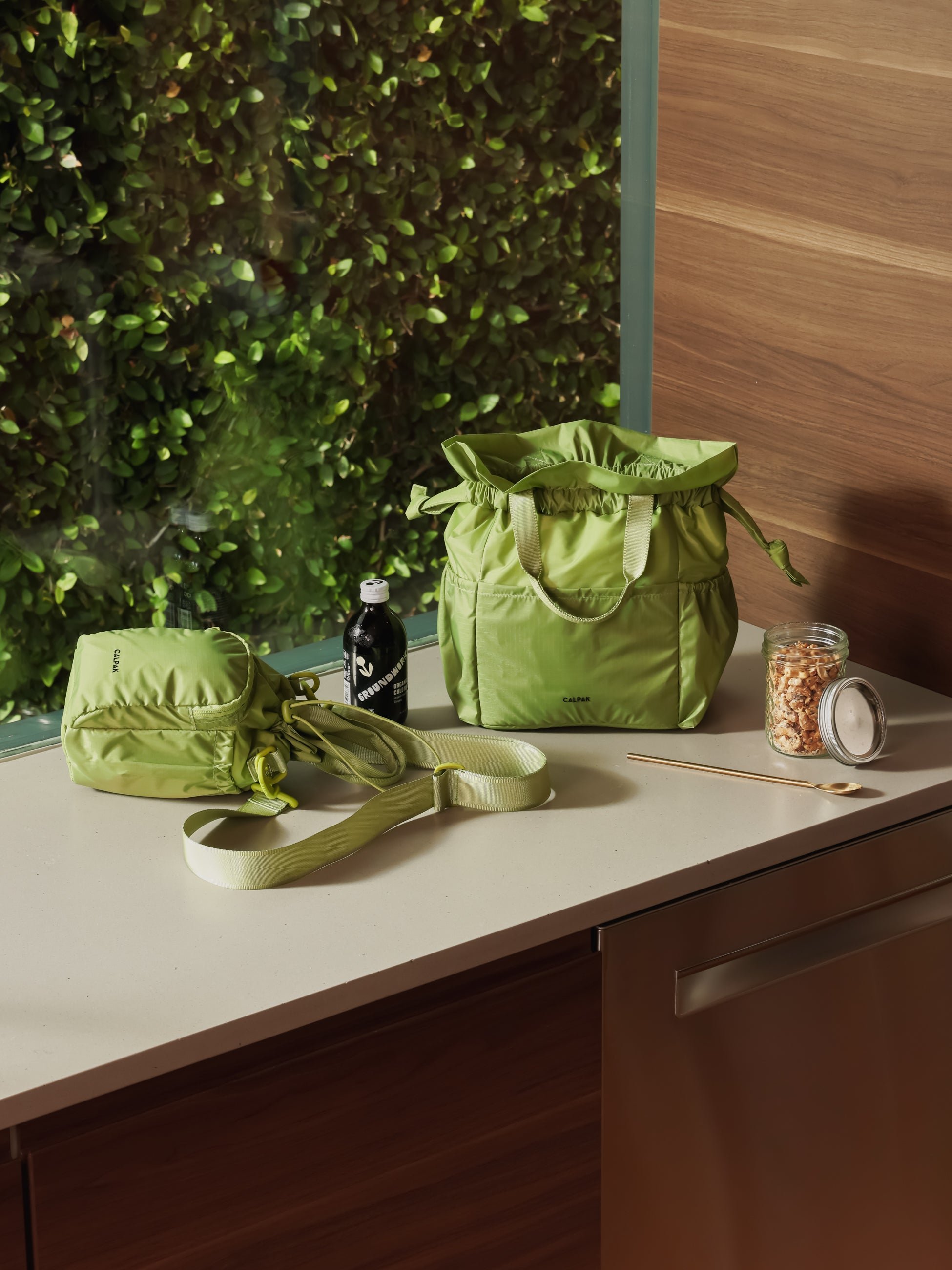 CALPAK Insulated Lunch Bag for women in light green