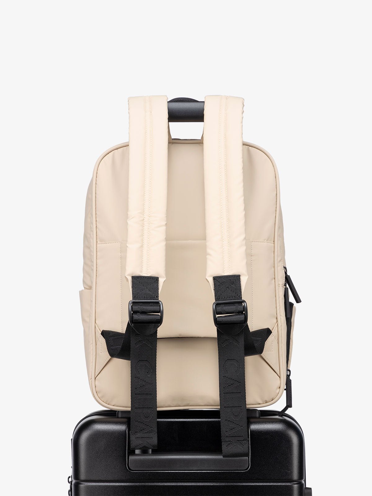 backpack with luggage strap in light cream oatmeal