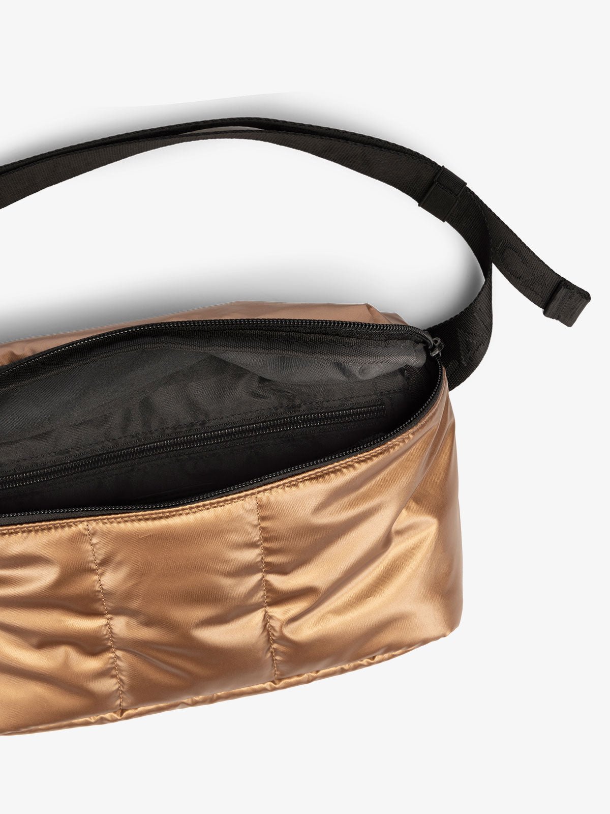 CALPAK Luka Belt Bag close up interior and strap in metallic copper