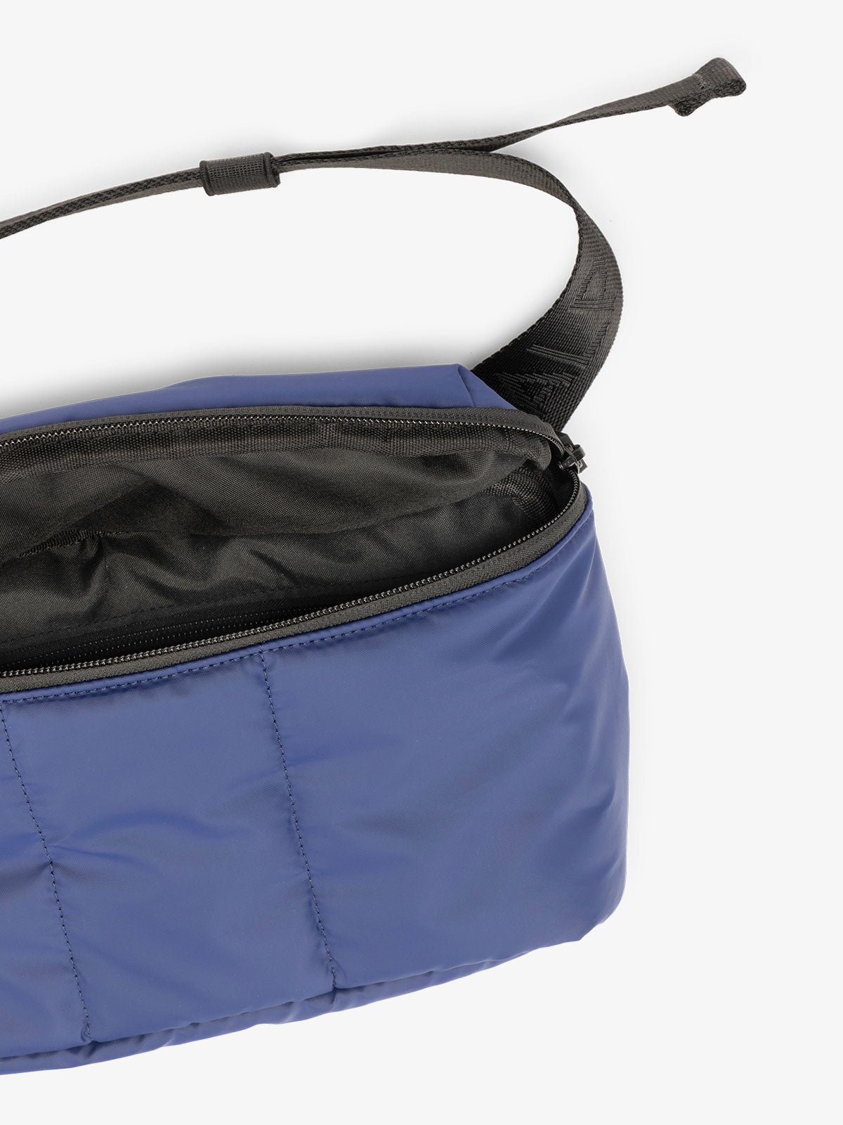 CALPAK Luka Belt Bag close up interior and strap in dark blue navy
