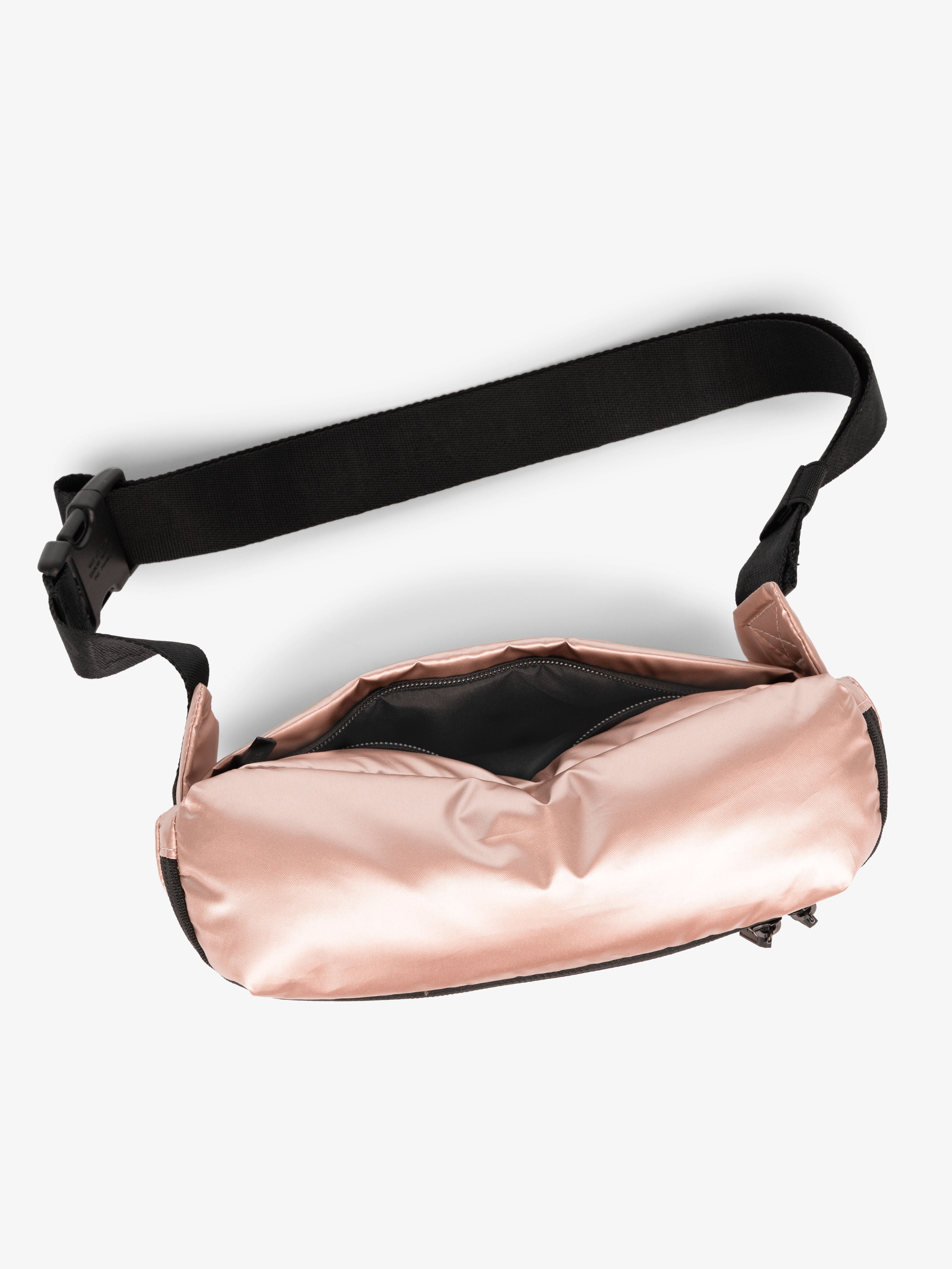 CALPAK Luka Belt Bag with adjustable strap and hidden back pocket in metallic rose gold