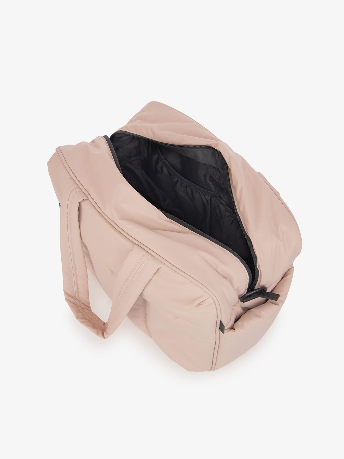 matte pink CALPAK Luka duffle bag for women