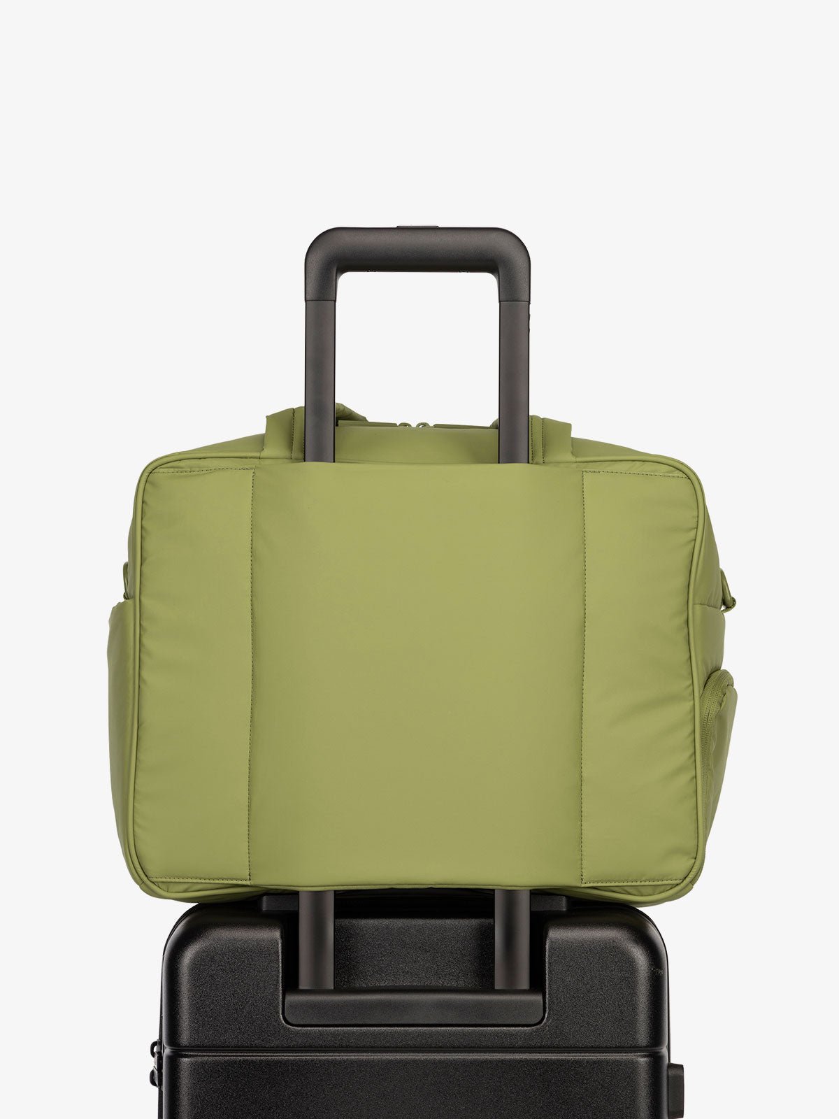 CALPAK Luka Duffel bag with luggage trolley sleeve in pistachio green