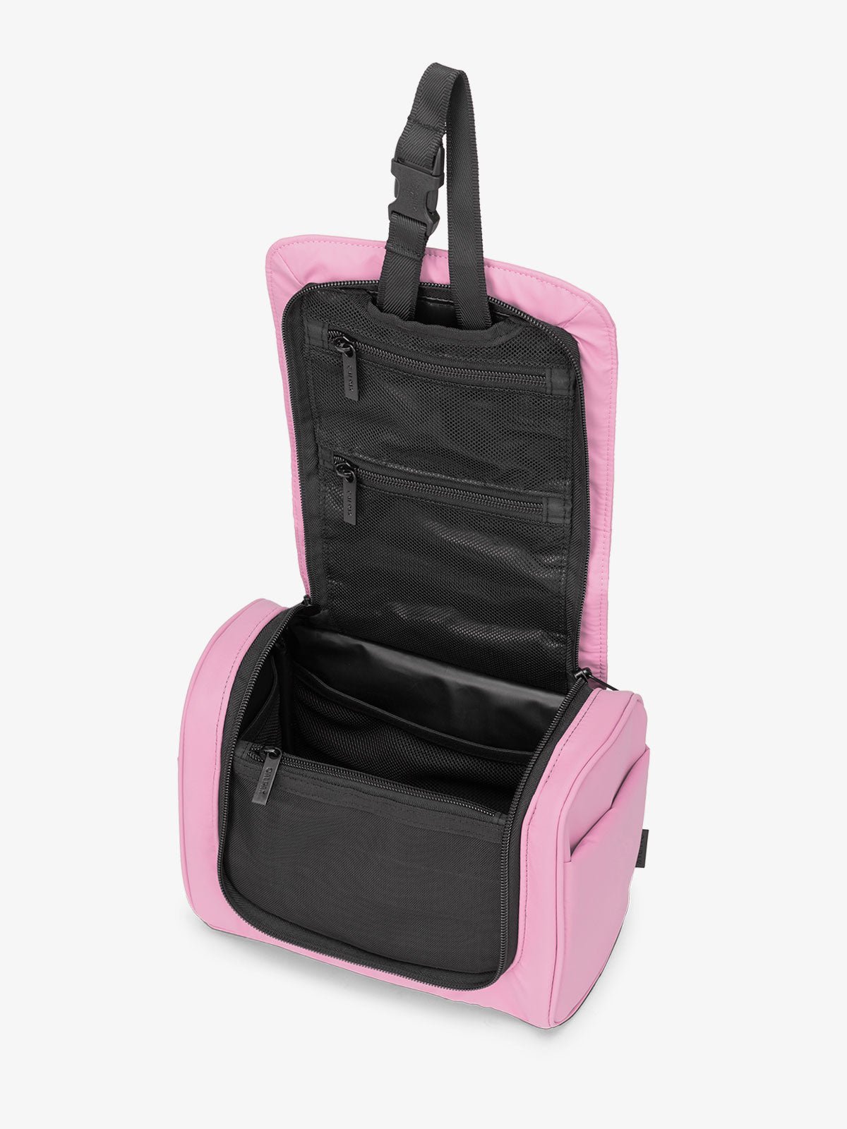 Luka Hanging Toiletry Bag with multiple interior pockets and retractable hanging strap in bubblegum pink