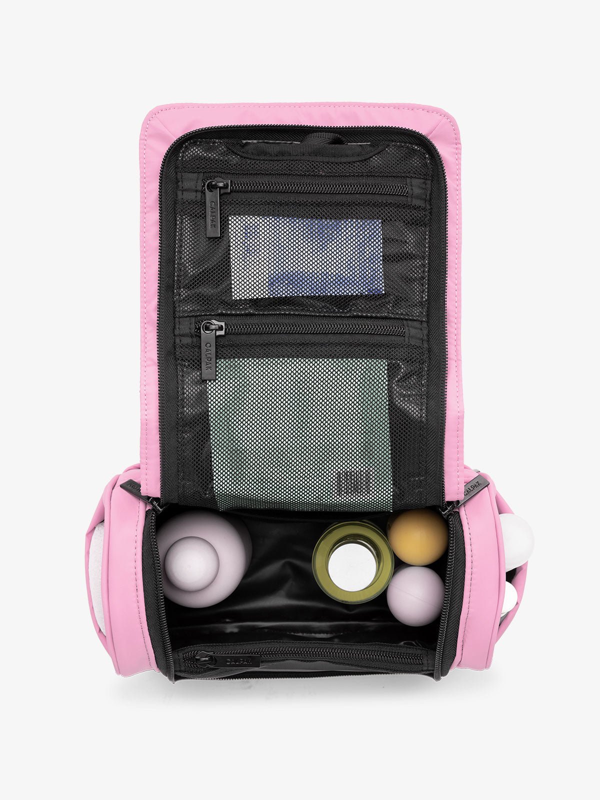 luka hanging toiletry bag with multiple interior and exterior pockets and compartments in bright pink