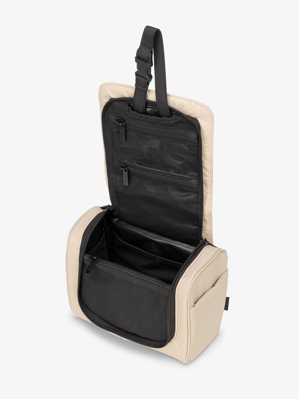 Luka Hanging Toiletry Bag with multiple interior pockets and retractable hanging strap in beige oatmeal