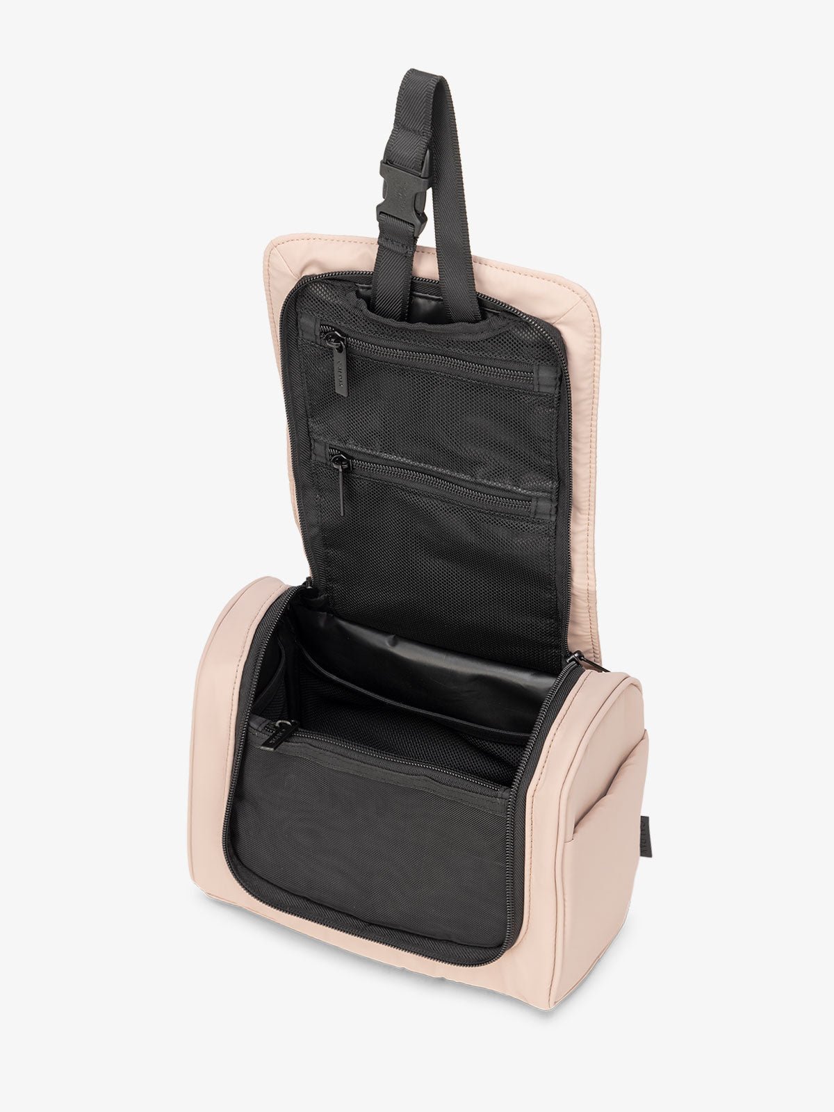 Luka Hanging Toiletry Bag with multiple interior pockets and retractable hanging strap in rose quartz pink
