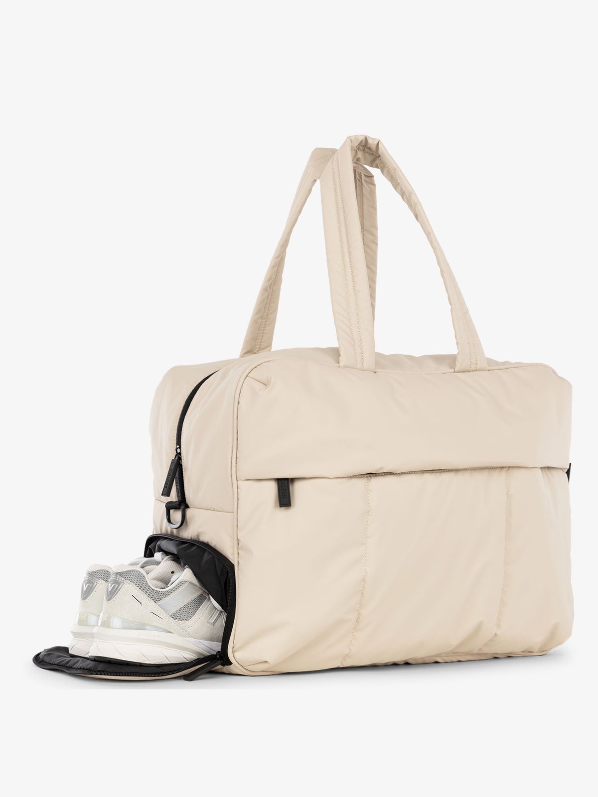 CALPAK Luka large duffel bag with side shoe compartment and dual handles in oatmeal