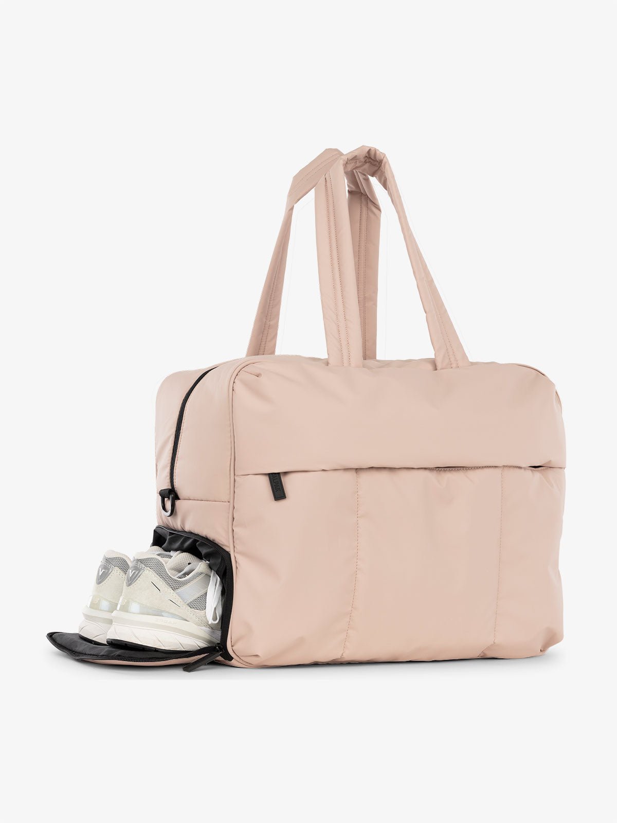 CALPAK Luka large duffel bag with side shoe compartment and dual handles in rose quartz