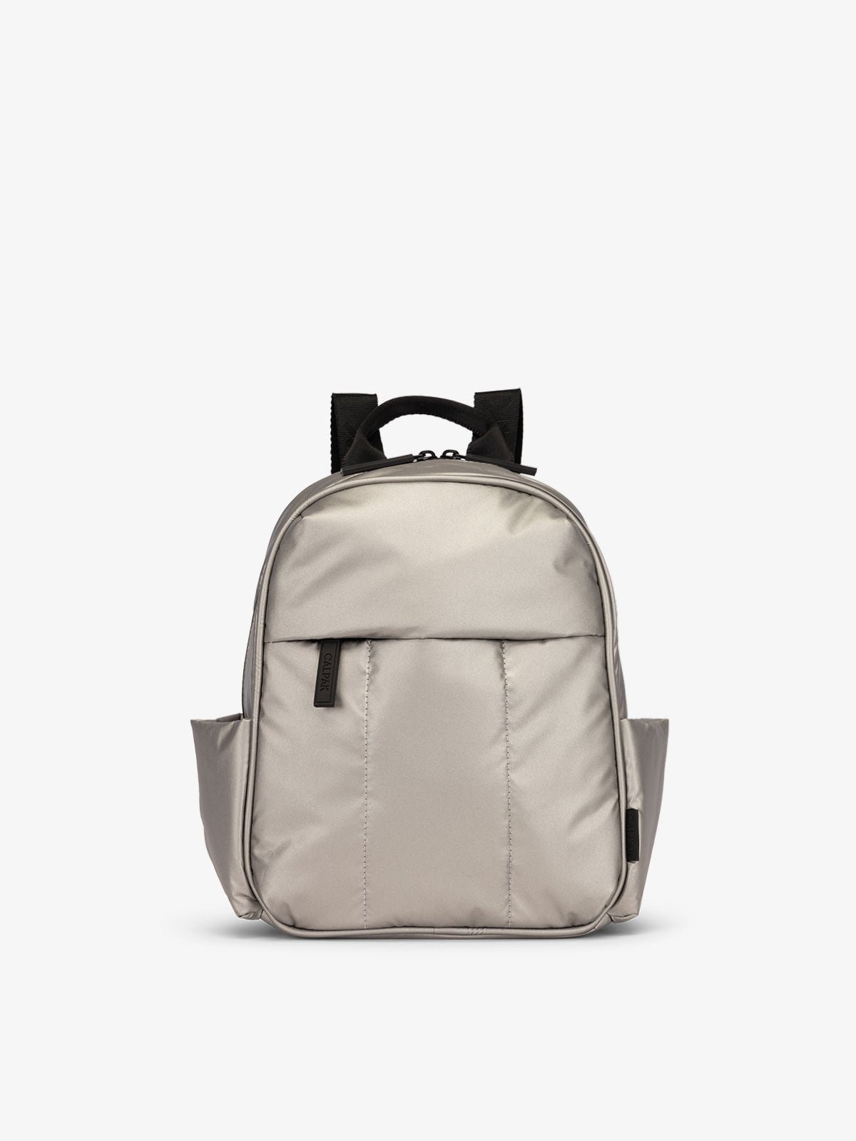 CALPAK Luka Mini Backpack with soft puffy exterior and front zippered pocket in metallic silver