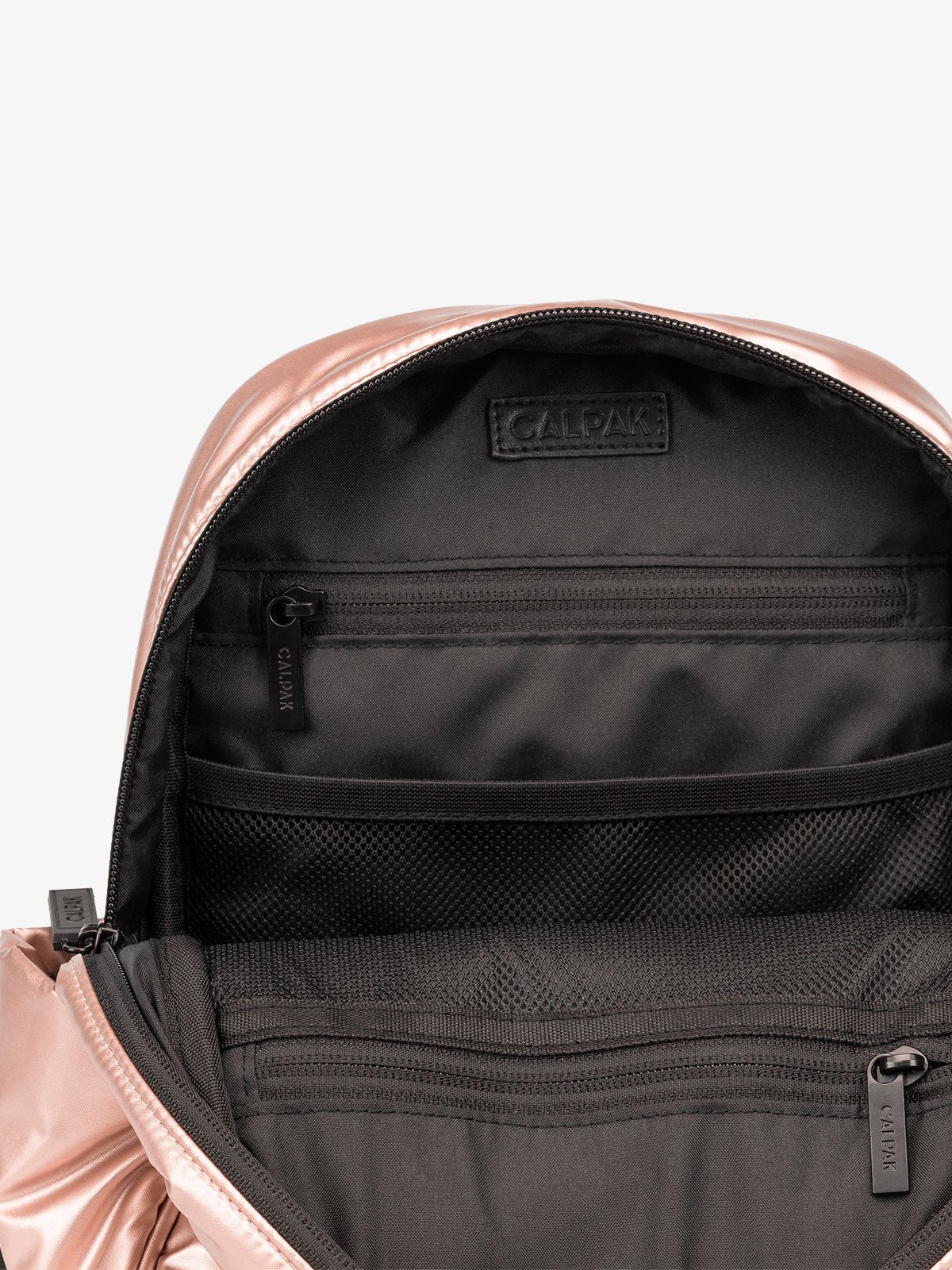 CALPAK Luka Mini travel Backpack with water resistant interior lining and multiple pockets in pink rose gold