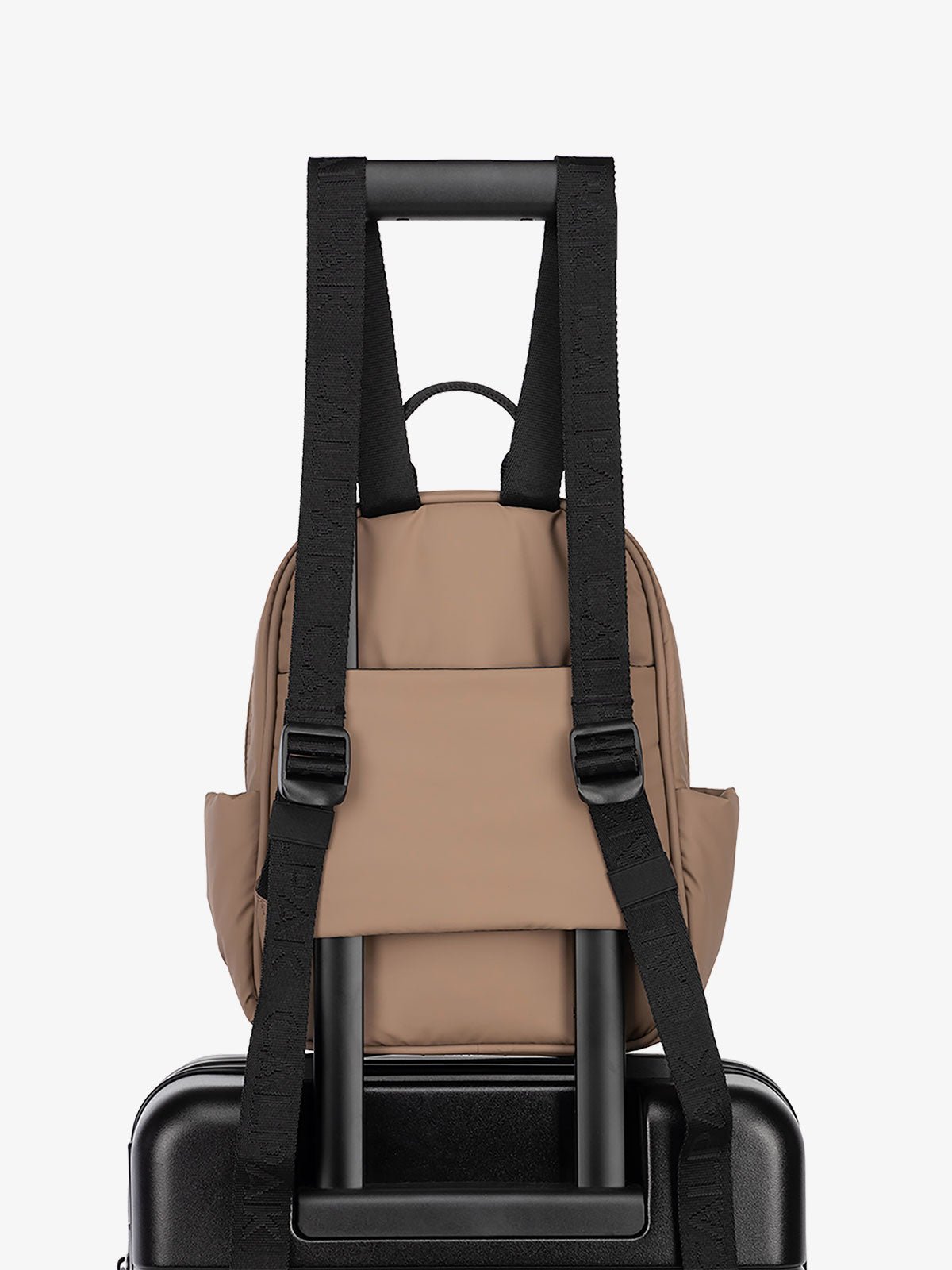 CALPAK Luka small travel Backpack with adjustable shoulder straps and trolley sleeve in brown