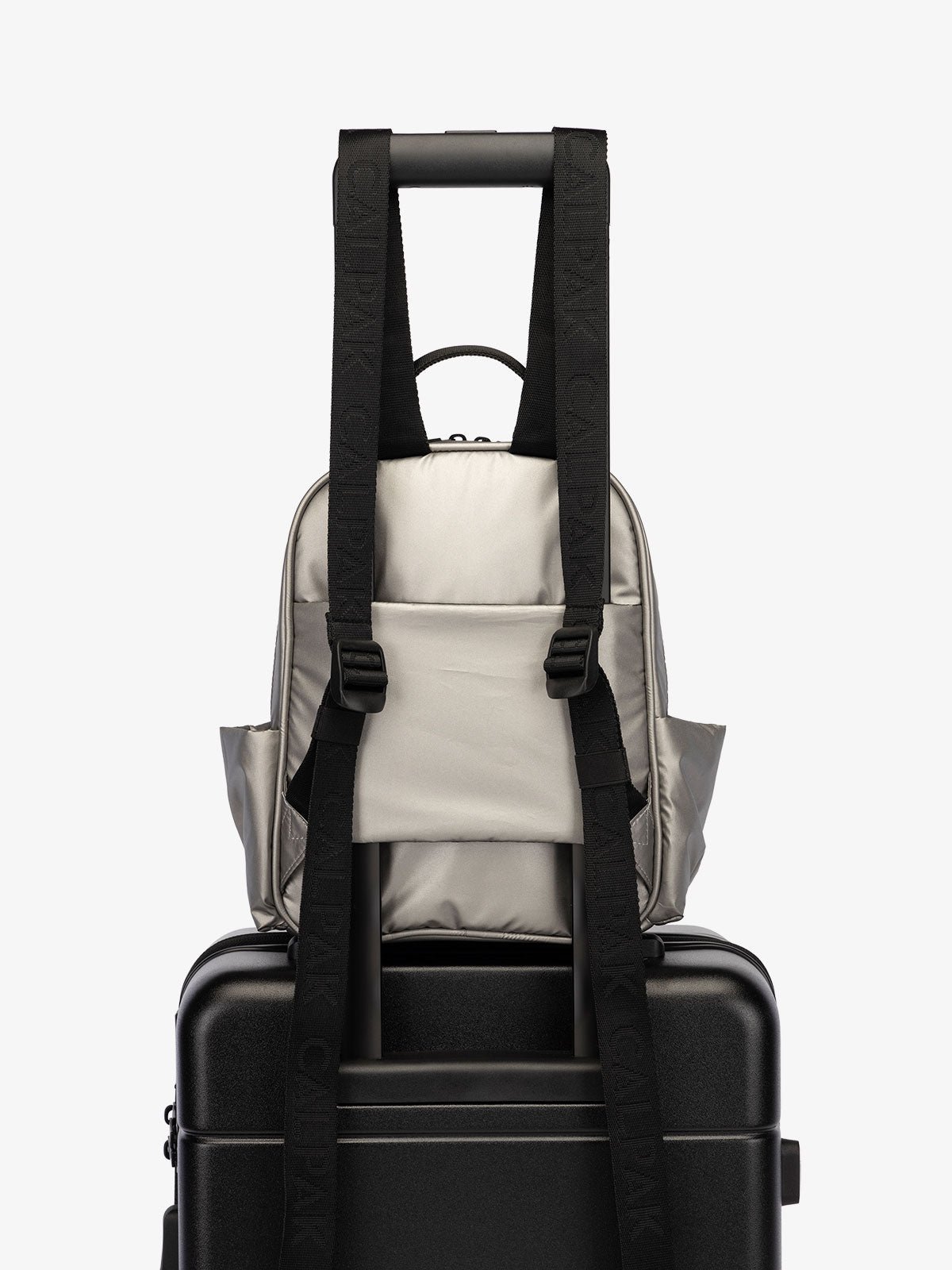 CALPAK Luka small travel Backpack with luggage sleeve and adjustable straps in metallic gray gunmetal