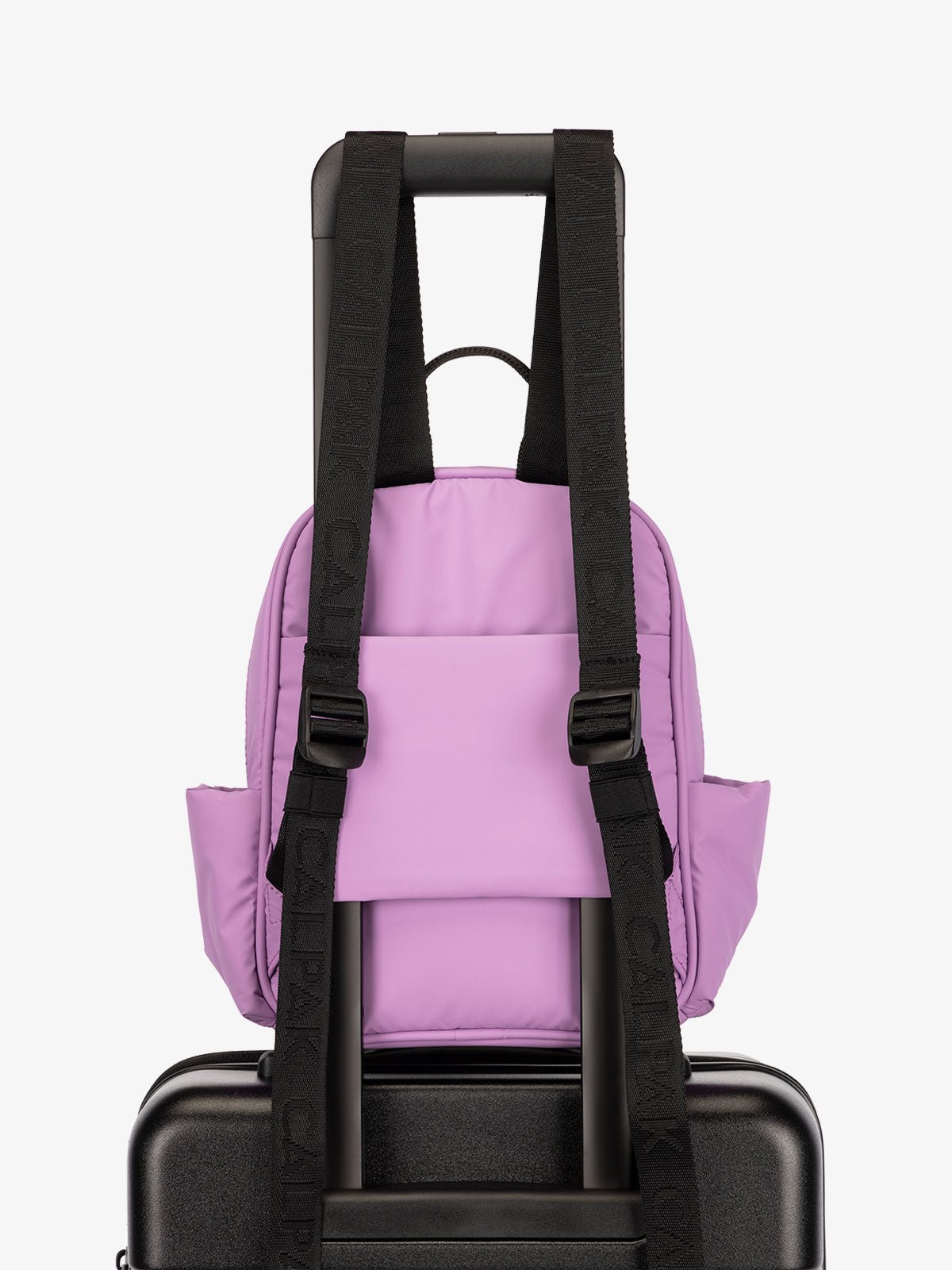 CALPAK Luka small travel Backpack with luggage sleeve and adjustable straps in lavender lilac