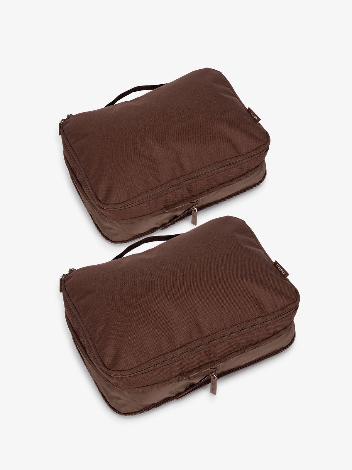 CALPAK compression packing cubes with top handles in dark brown walnut