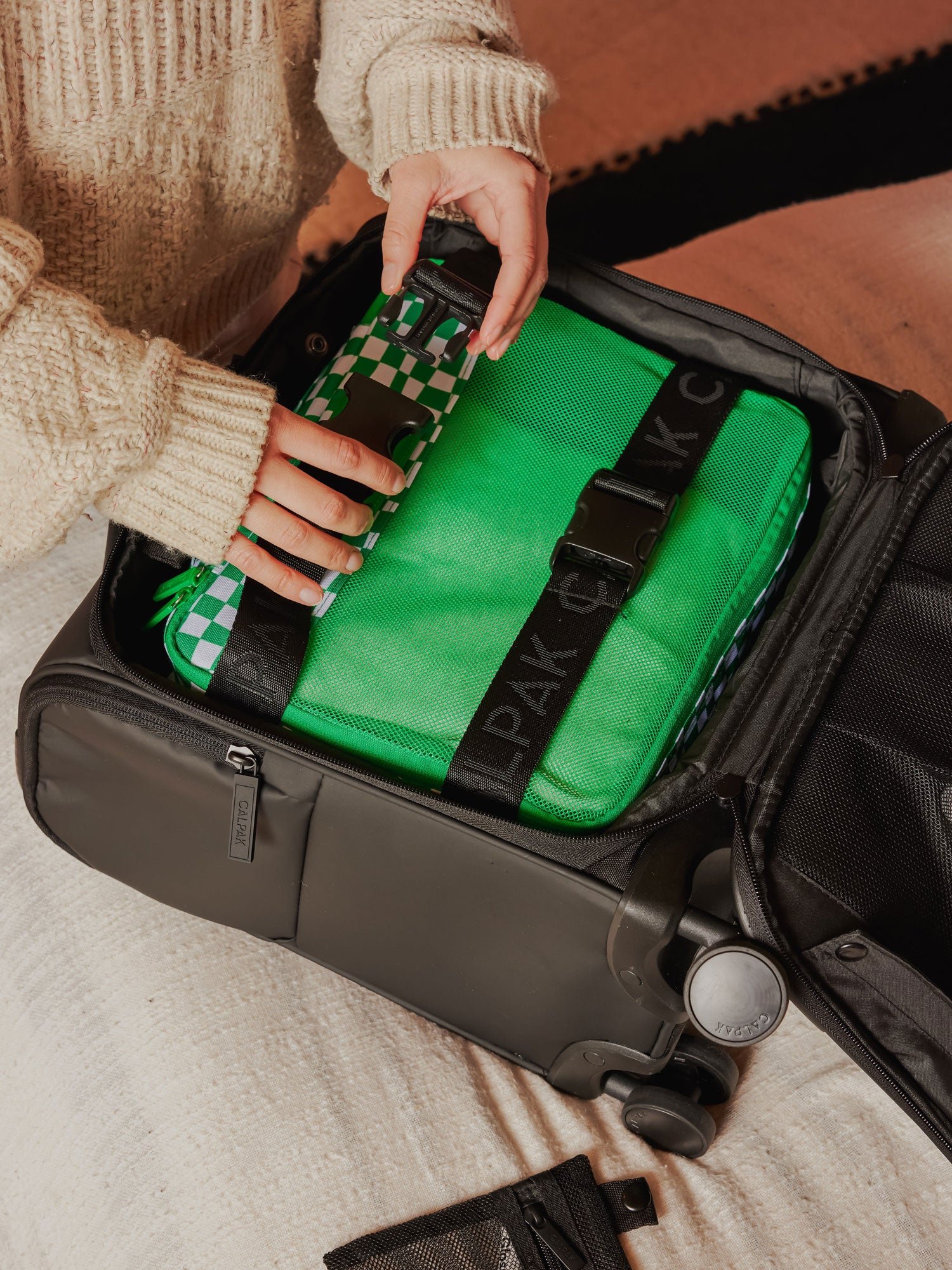 CALPAK 5 piece set packing cubes for travel with labels and top handles mesh front in green checkerboard print