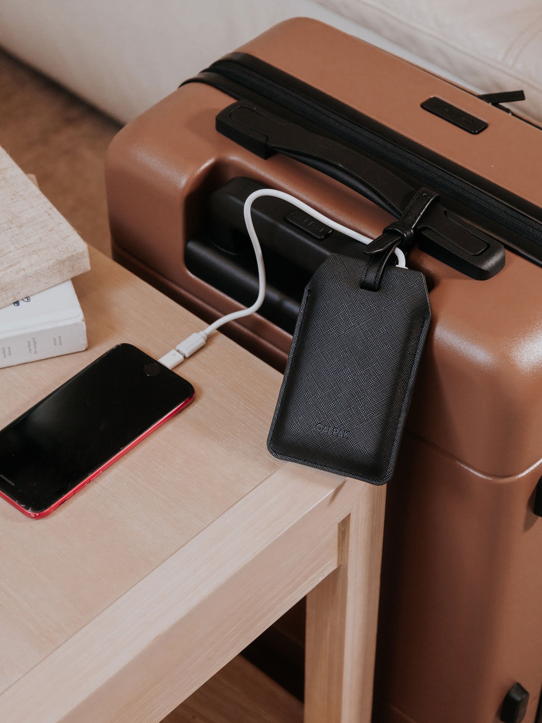 portable luggage tag charger on luggage