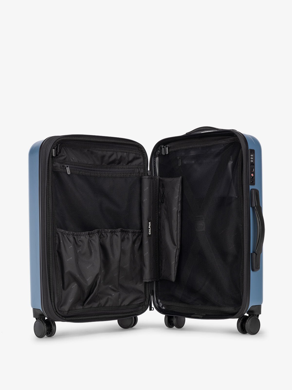 CALPAK Hard sided luggage bundle interior compartments and compression straps in blue