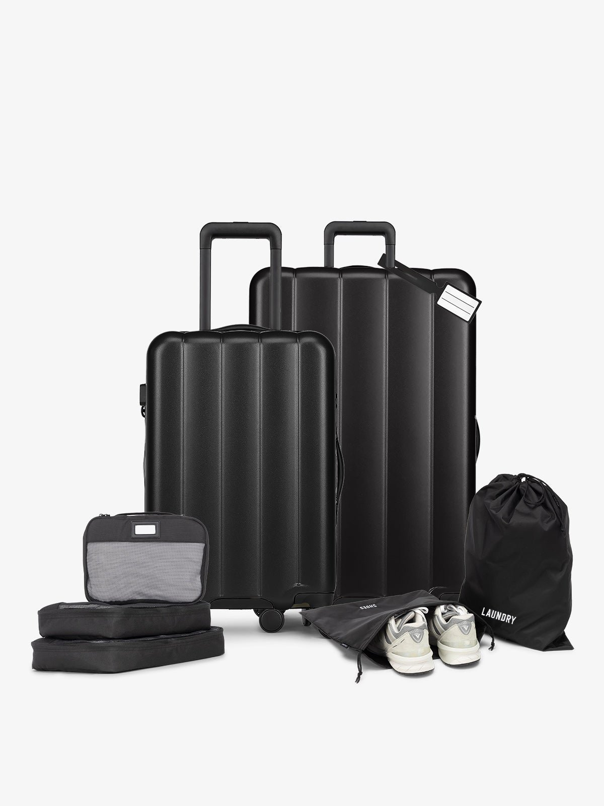 CALPAK starter bundle with carry-on, large luggage, packing cubes, pouches, and luggage tag
