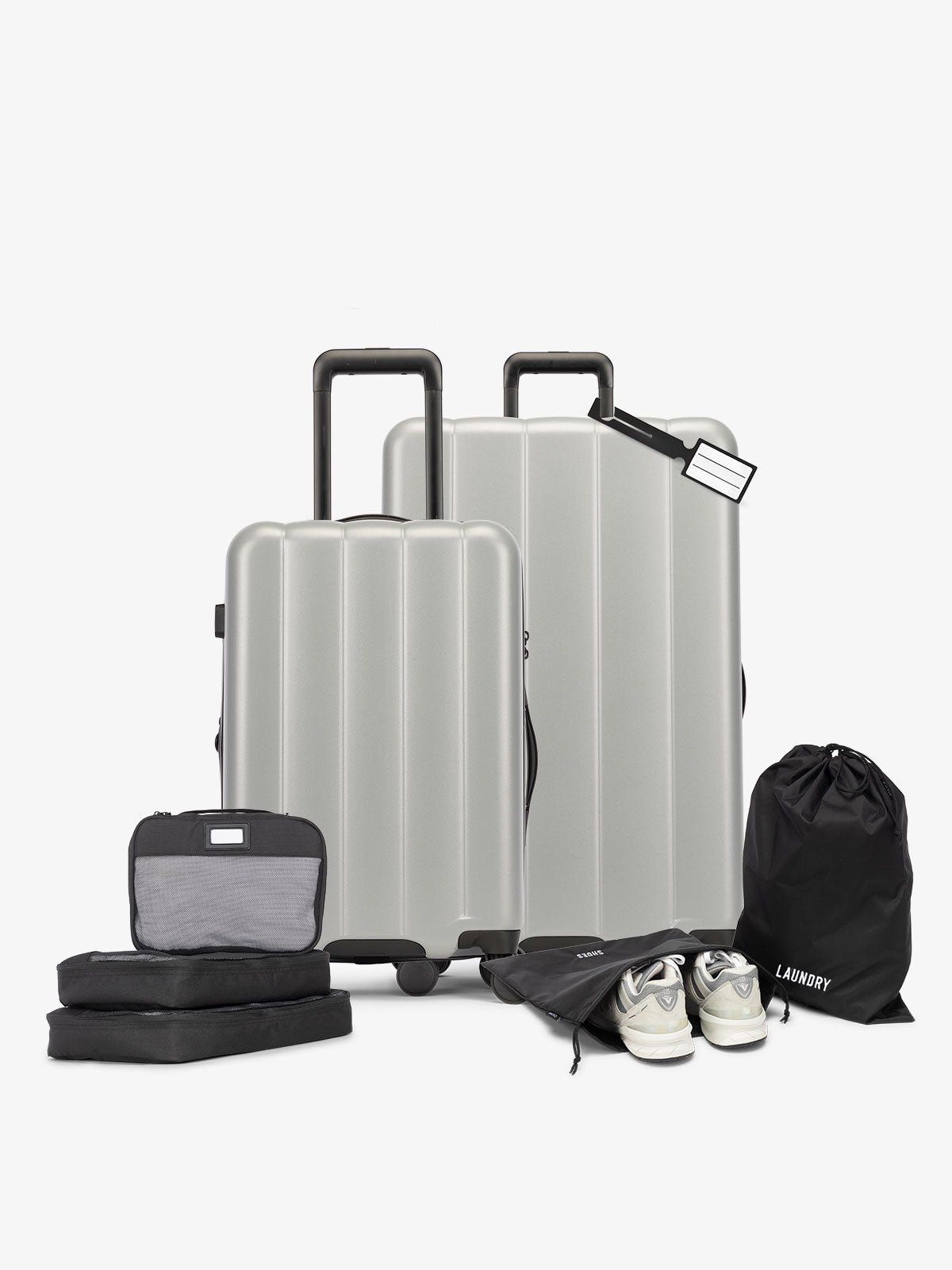 CALPAK Starter Luggage Set with Carry-On, Large Luggage, Packing Cubes, Pouches and Luggage tag in gray smoke