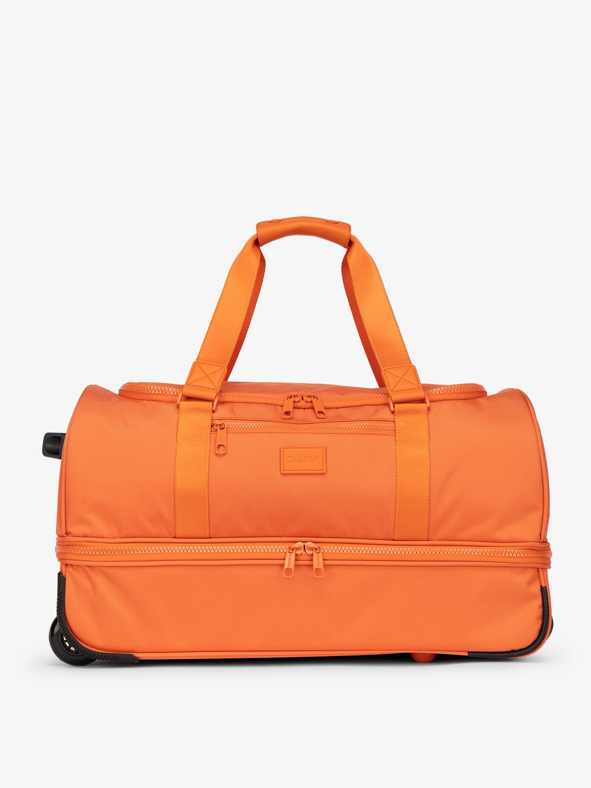 CALPAK Stevyn Rolling Duffel bag with dual top handles and shoe compartment in orange