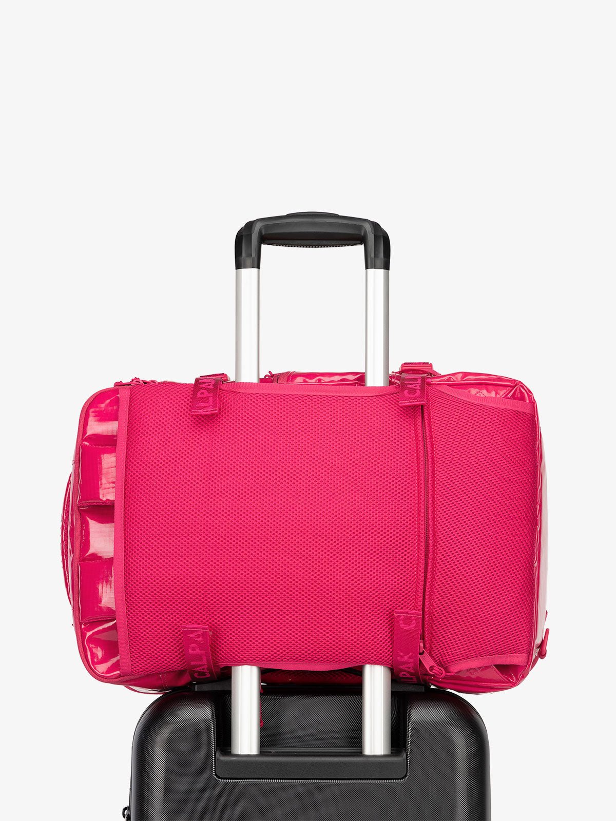 CALPAK Terra 26L Laptop Backpack Duffel with luggage trolley sleeve in dragonfruit pink