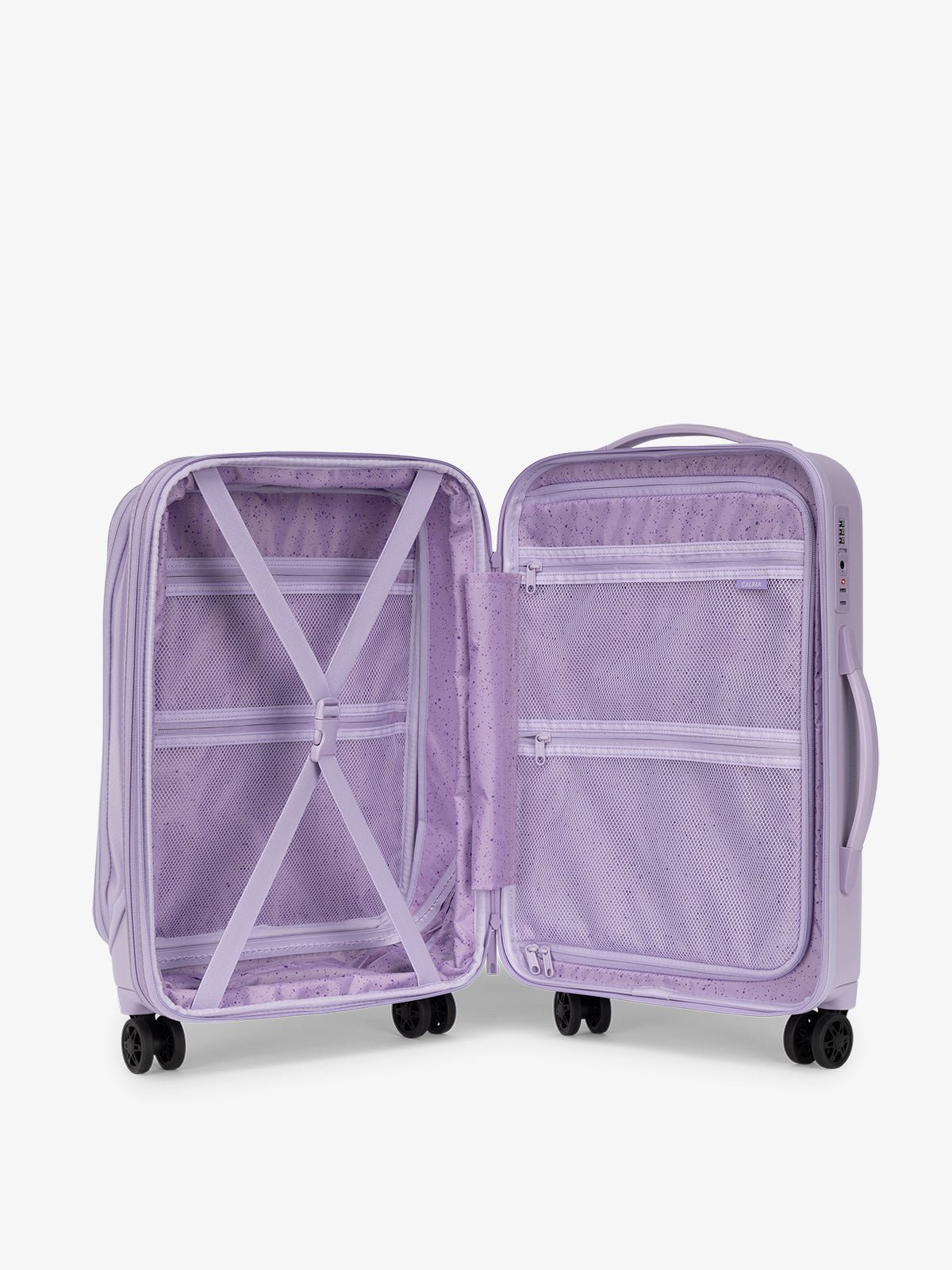 CALPAK Terra Carry-On Luggage interior with multiple zipped pockets and compression strap in purple