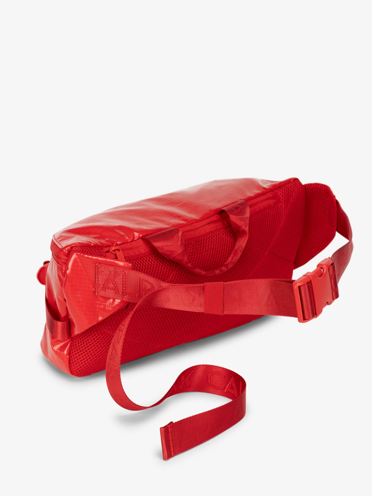CALPAK Terra Sling Bag for women with adjustable crossbody strap and top handle in flaming red