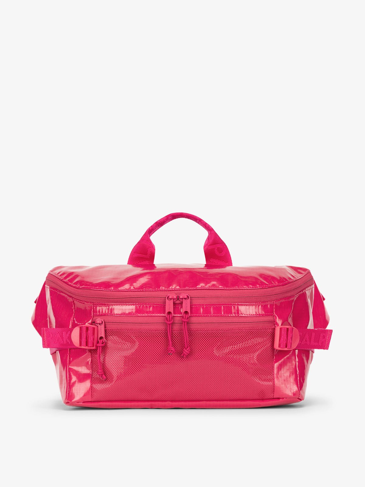 CALPAK Terra Sling Bag with mesh front pocket and top handle in pink dragonfruit