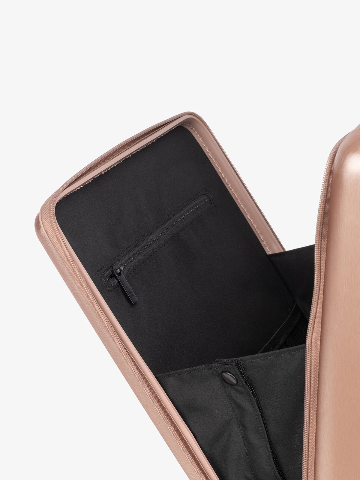 CALPAK Ambeur hard shell carry-on luggage with front pocket for laptop in rose gold