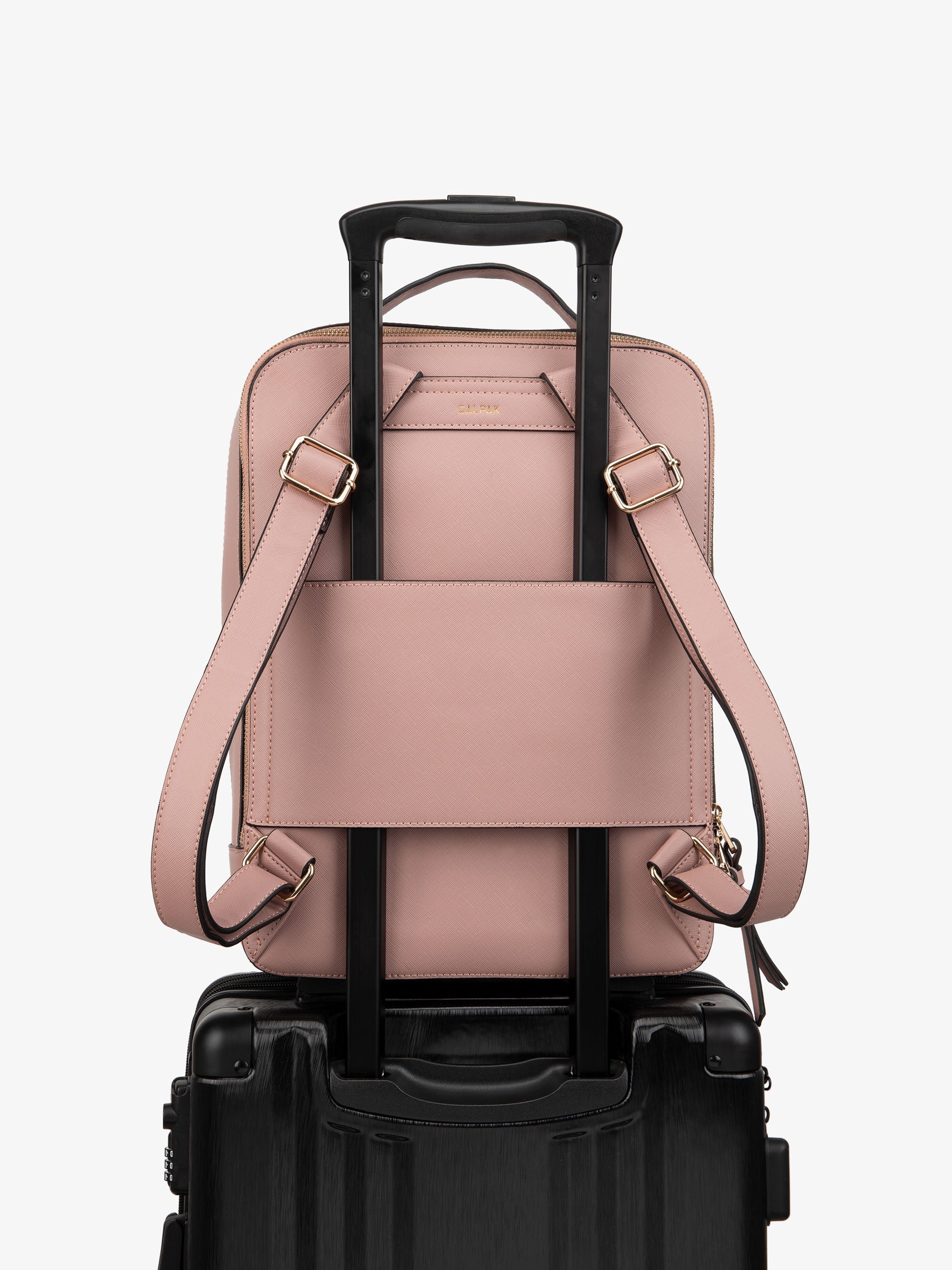 pink mauve Kaya laptop backpack with luggage trolley sleeve