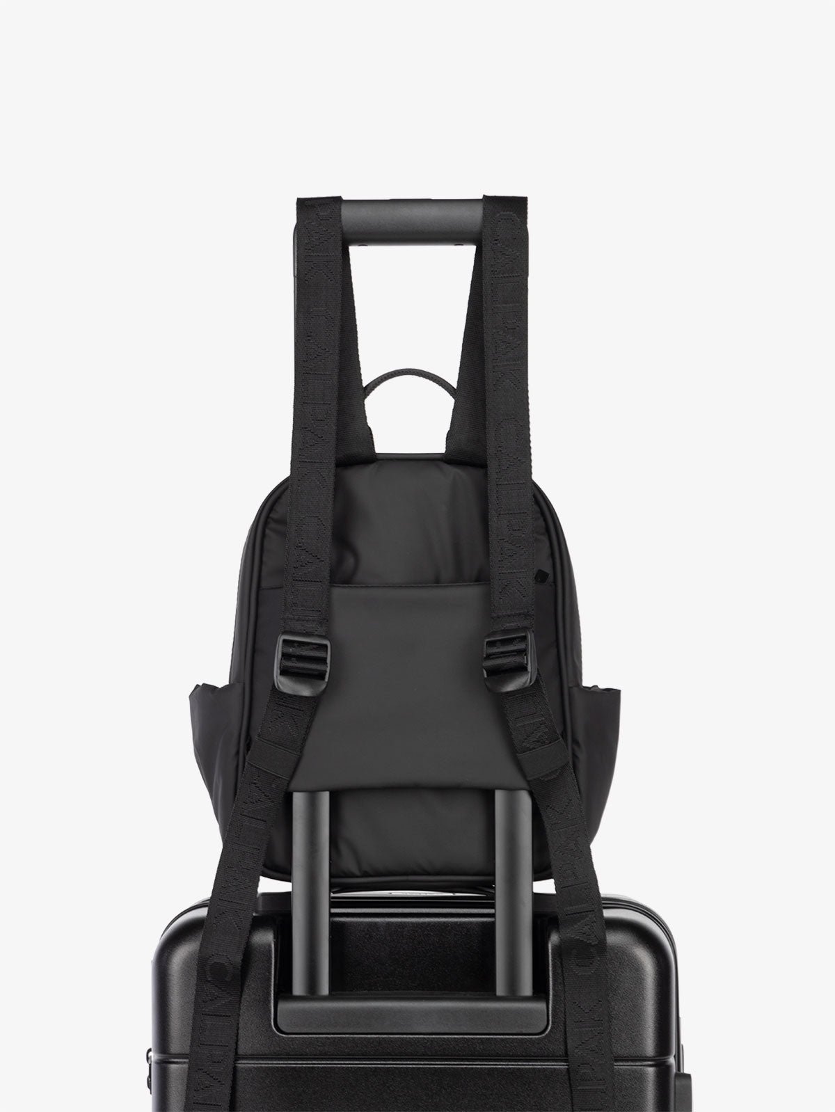 CALPAK Luka Mini Backpack for travel with luggage sleeve in black
