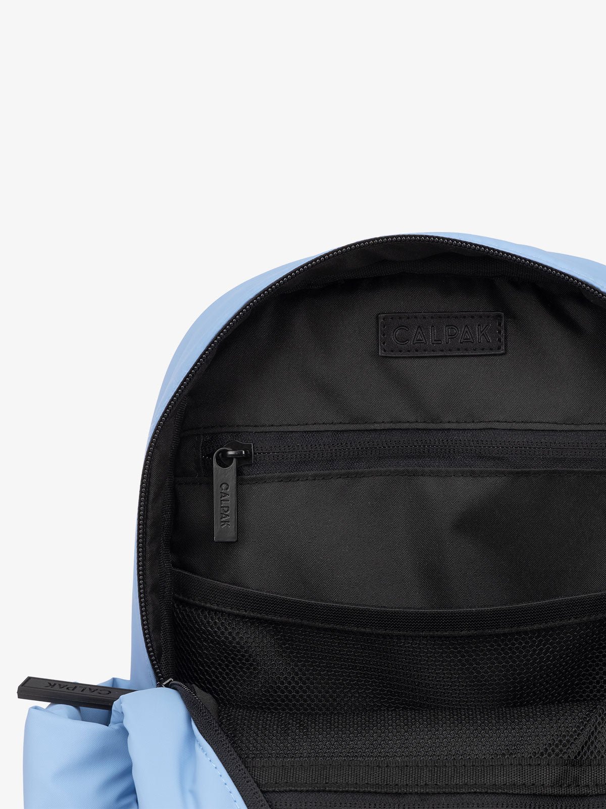 CALPAK Luka Mini Backpack with multiple interior pockets in light blue