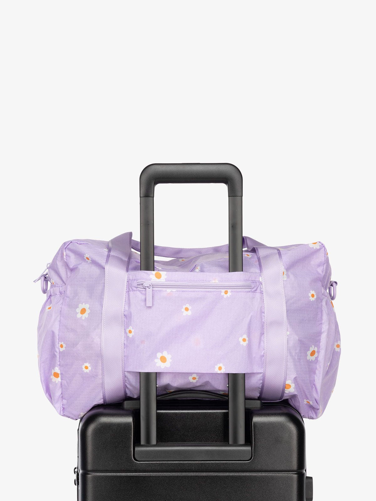 CALPAK Compakt nylon duffle bag with trolley sleeve and zippered pocket in orchid fields lavender