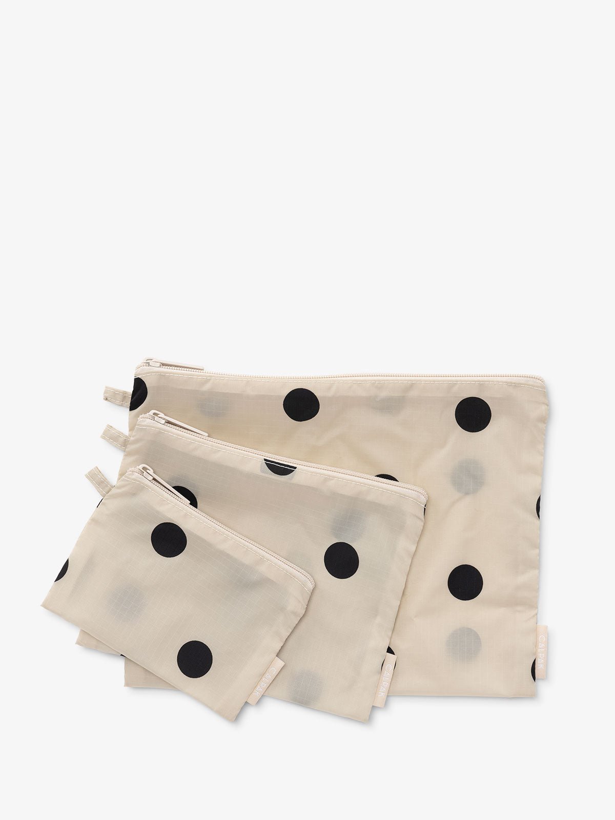 Set of small bags for storage and travel in polka-dot