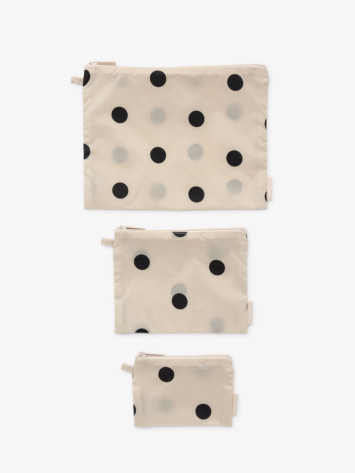 Set of small bags for storage and travel in polka-dot