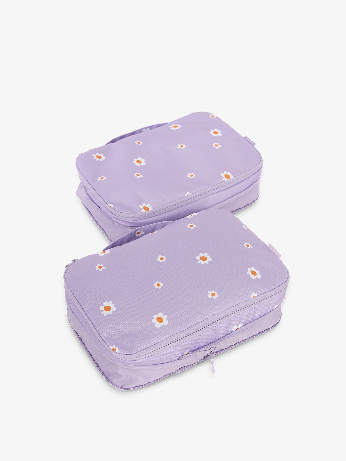 CALPAK compression packing cubes with handles in purple floral print