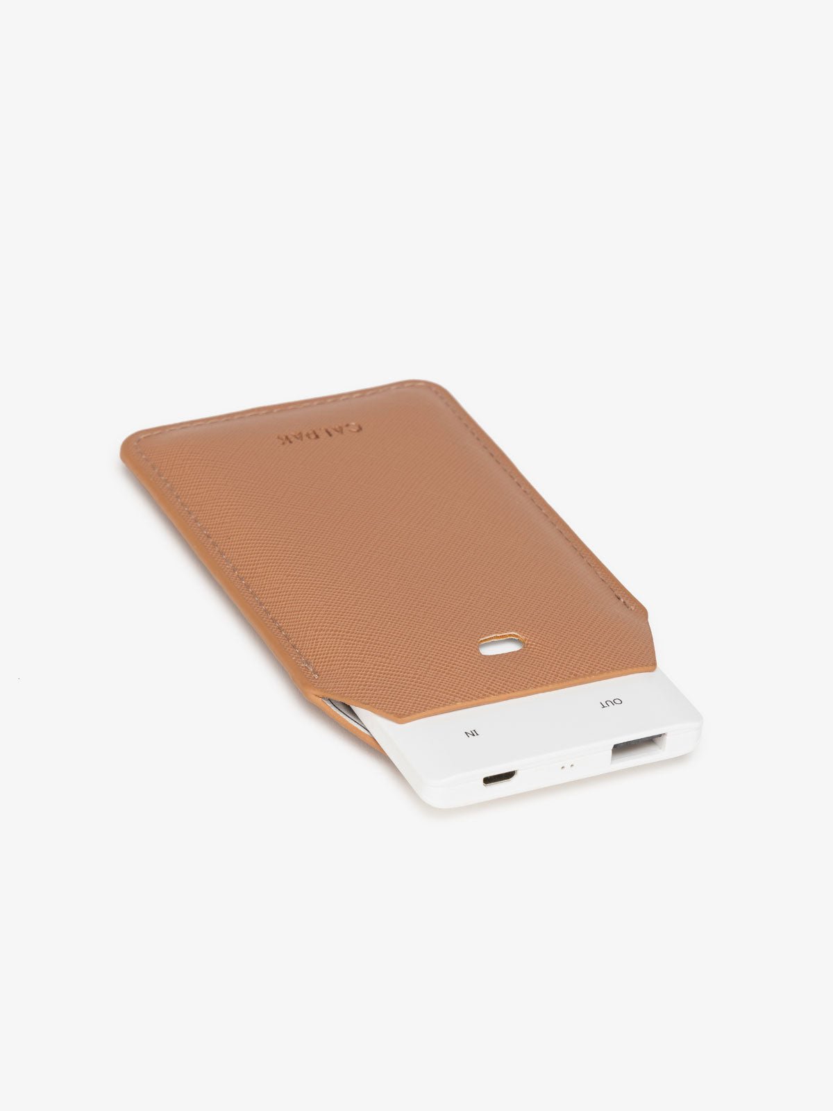 CALPAK portable charger in caramel color