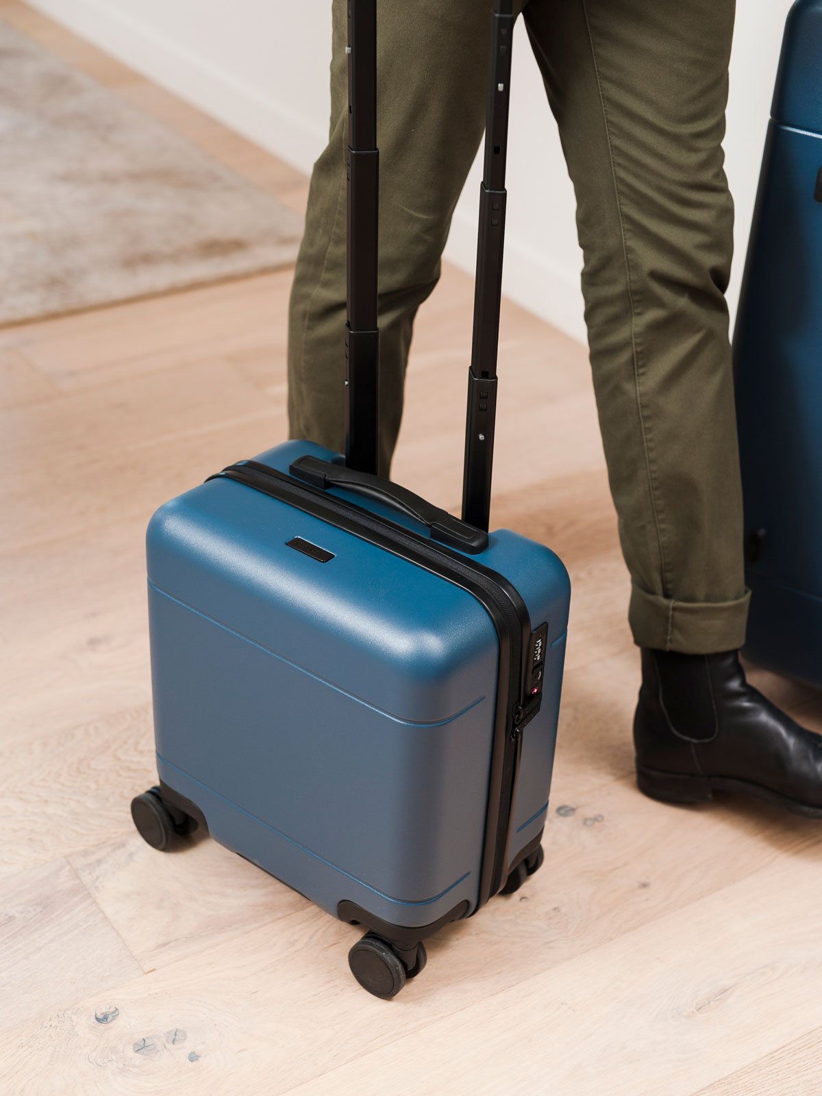 carry on spinner mini luggage in atlantic blue