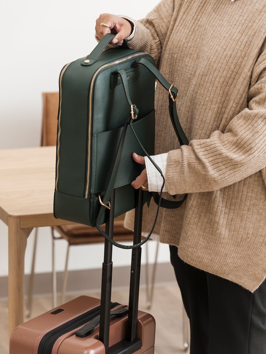 CALPAK Kaya laptop backpack with trolley sleeve for luggage
