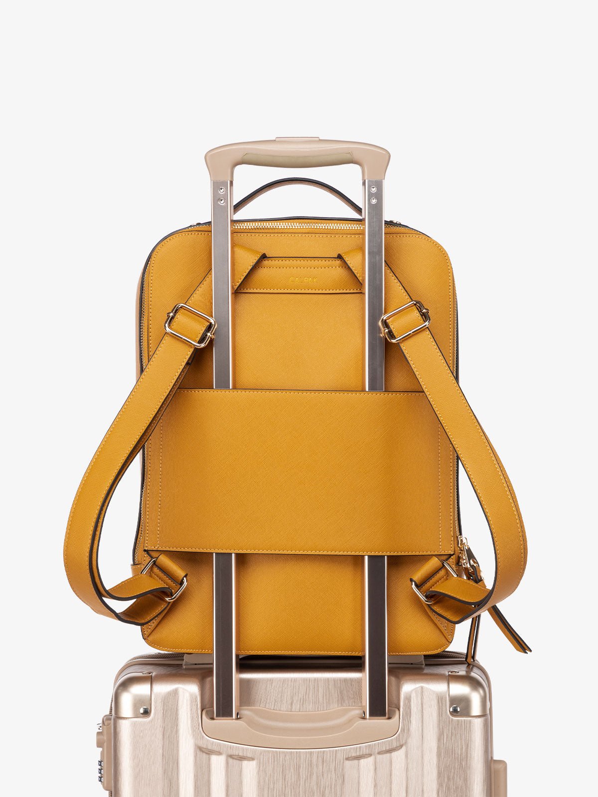 CALPAK Kaya Laptop Backpack with trolley sleeve for travel in yellow honey