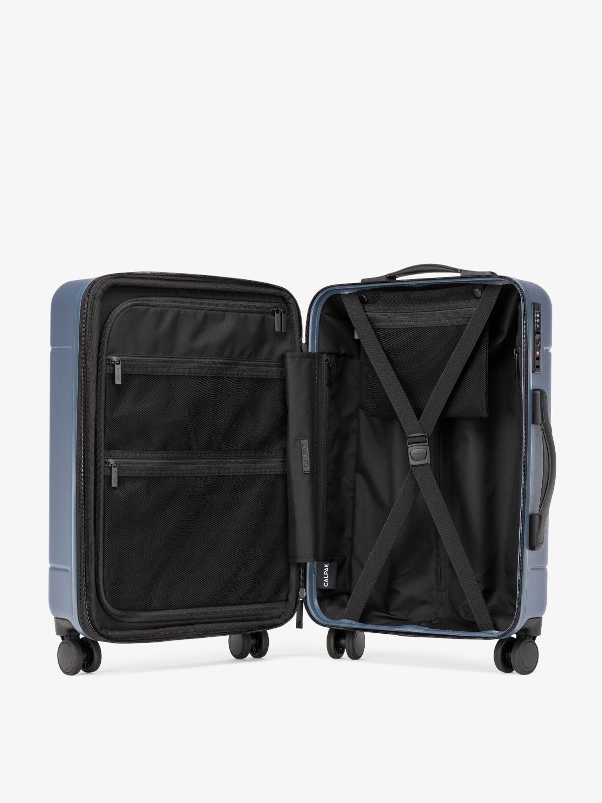 the interior of CALPAK Hue hard shell carry-on spinner luggage in blue atlantic