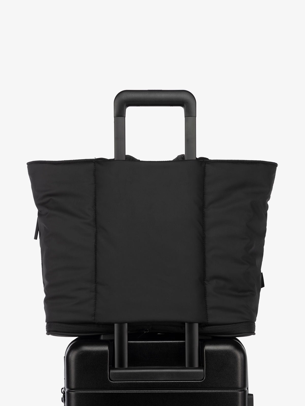 CALPAK Luka expandable travel tote bag with trolley sleeve in black
