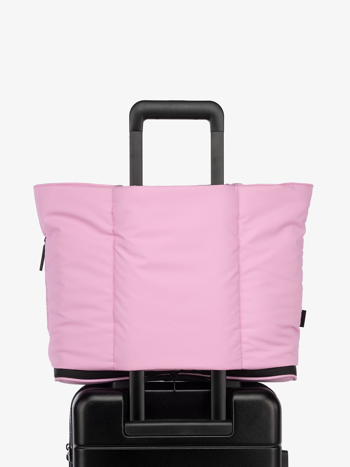 CALPAK Luka expandable travel tote bag with trolley sleeve in bubblegum